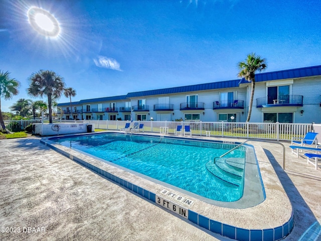 view of pool with a patio area