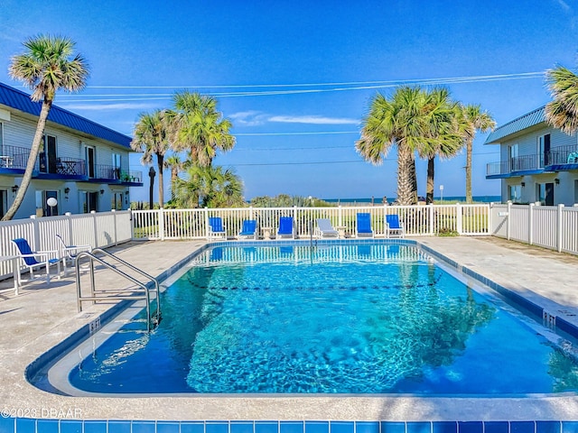 view of pool featuring a patio area