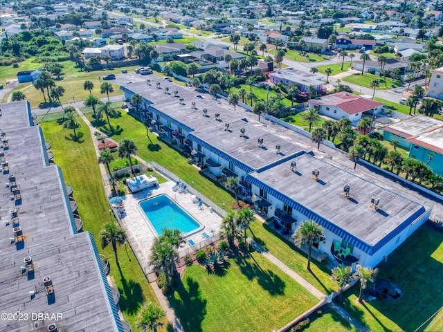 birds eye view of property with a residential view