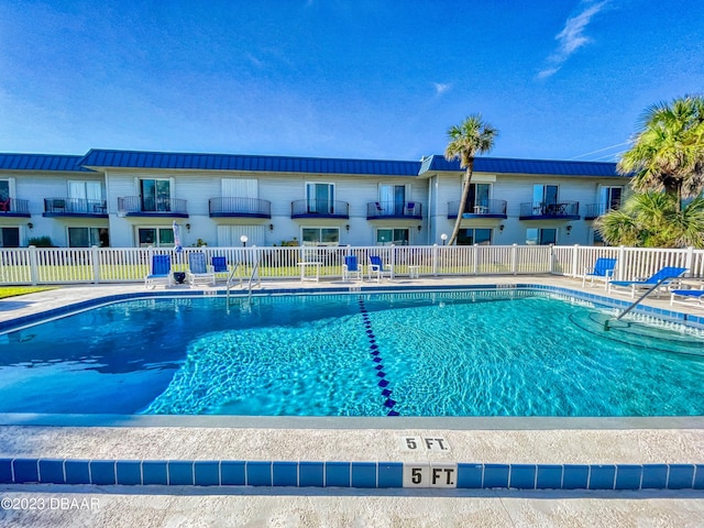 pool featuring fence