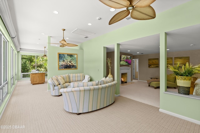 1010/1020 Big Tree Rd, Daytona Beach, FL 32119 - living area with light colored carpet, ceiling fan, a warm lit fireplace, and recessed lighting
