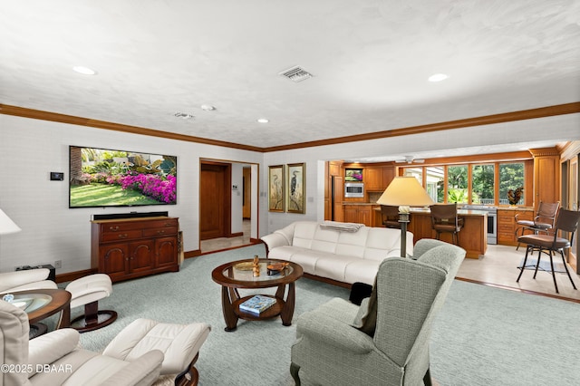 1010/1020 Big Tree Rd, Daytona Beach, FL 32119 - living room featuring recessed lighting, light colored carpet, and ornamental molding