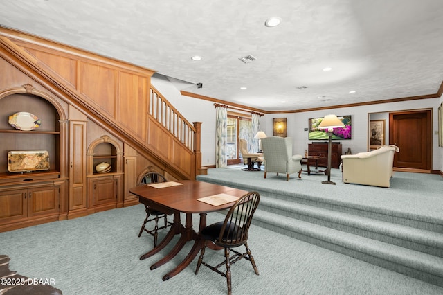 1010/1020 Big Tree Rd, Daytona Beach, FL 32119 - dining area with carpet floors, stairs, ornamental molding, recessed lighting, and built in features