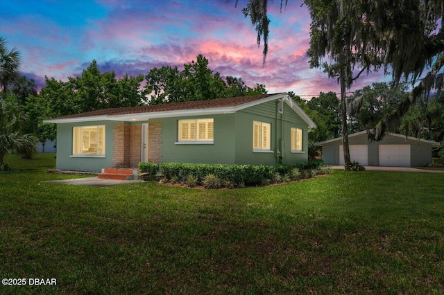 1010/1020 Big Tree Rd, Daytona Beach, FL 32119 - single story home featuring a garage, a front yard, and an outdoor structure