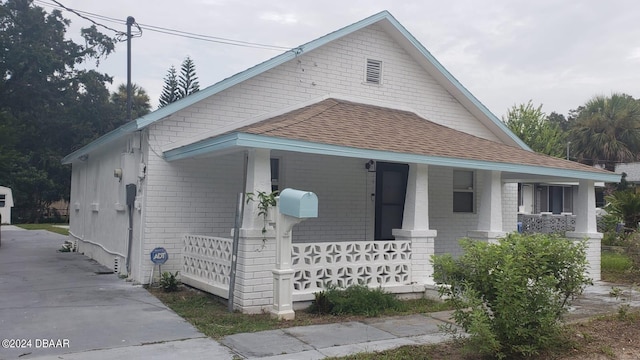 bungalow-style home with covered porch