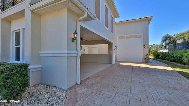 view of side of home with a garage