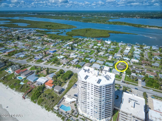 drone / aerial view with a water view