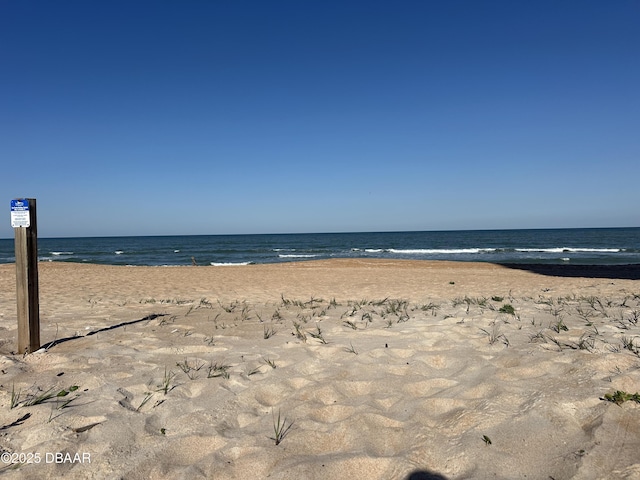 property view of water with a beach view