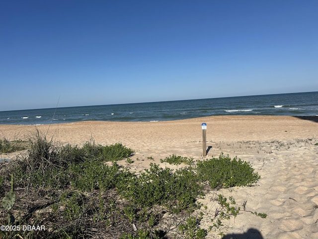 view of water feature with a view of the beach