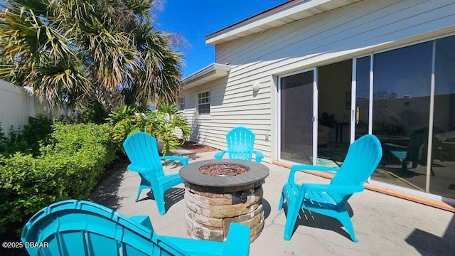 view of patio / terrace with a fire pit