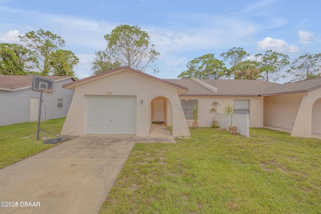 single story home with a garage and a front yard