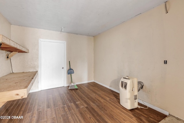 misc room with dark hardwood / wood-style flooring