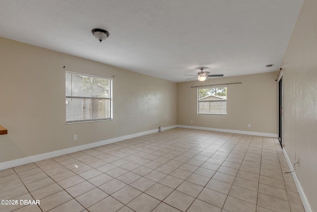 unfurnished room with ceiling fan