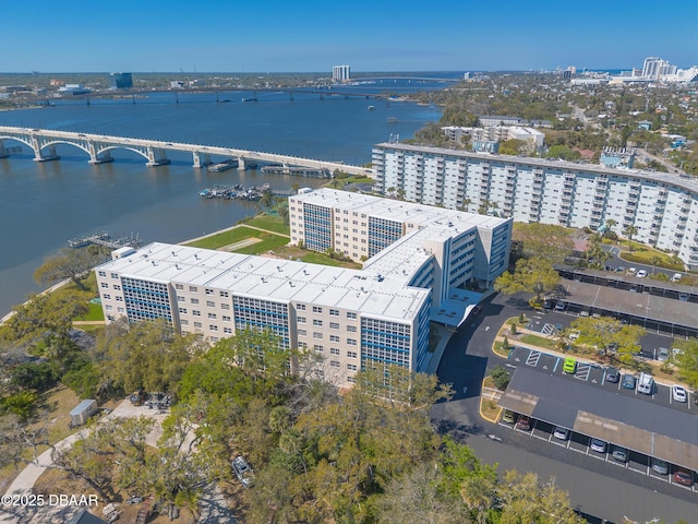 drone / aerial view with a water view and a city view