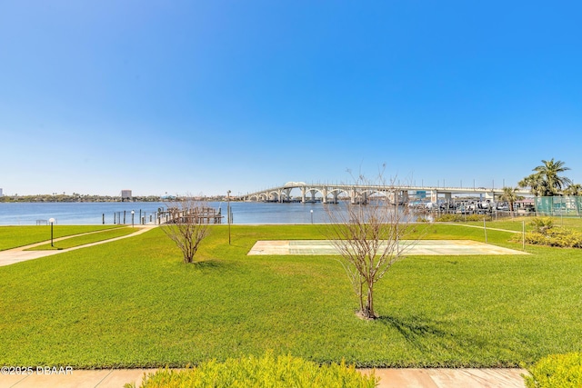 exterior space with a water view