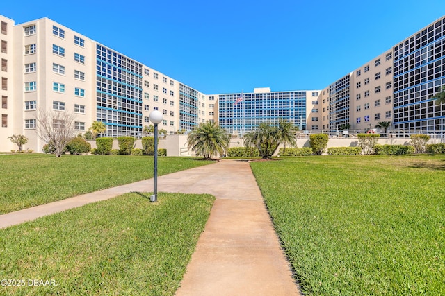 view of community with a lawn