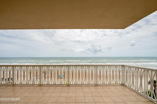 3801 S Atlantic Ave Unit 303, Daytona Beach Shores, FL 32118 - balcony featuring view of water and beach