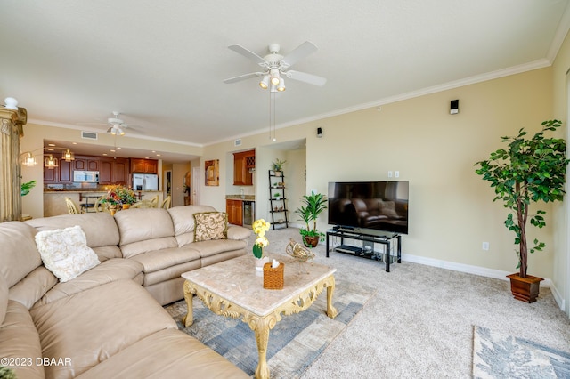 3801 S Atlantic Ave Unit 303, Daytona Beach Shores, FL 32118 - living area featuring ceiling fan, light colored carpet, ornamental molding, and baseboards