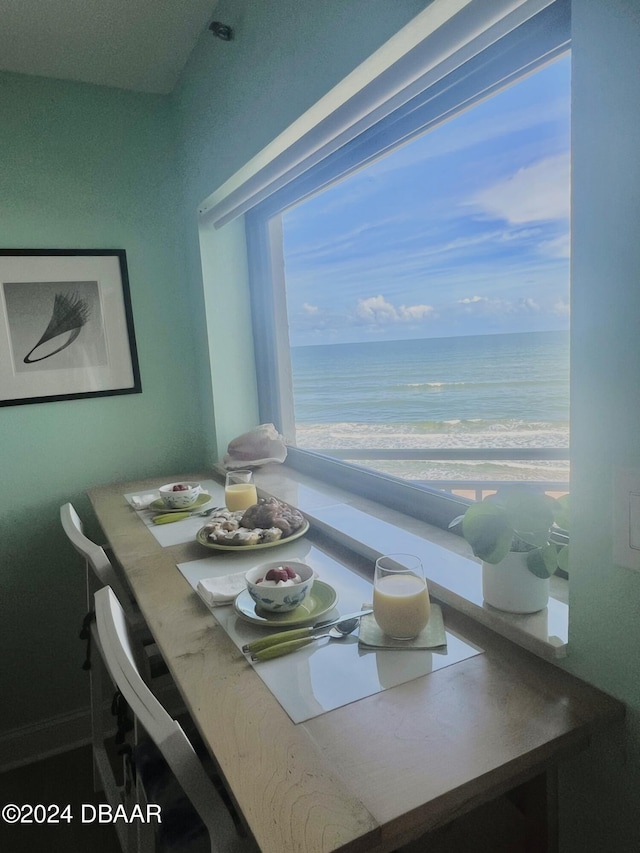 dining area with a water view