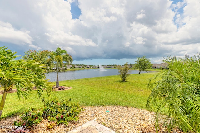 exterior space with a water view