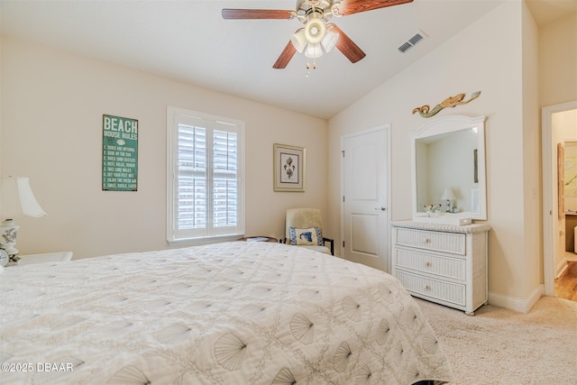 carpeted bedroom featuring ceiling fan and vaulted ceiling