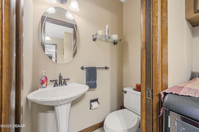 229 Riverbend Rd, Ormond Beach, FL 32174 - half bath with toilet and baseboards