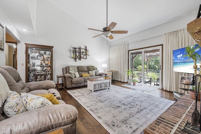 229 Riverbend Rd, Ormond Beach, FL 32174 - living area with ceiling fan, lofted ceiling, dark wood-style floors, and a textured ceiling