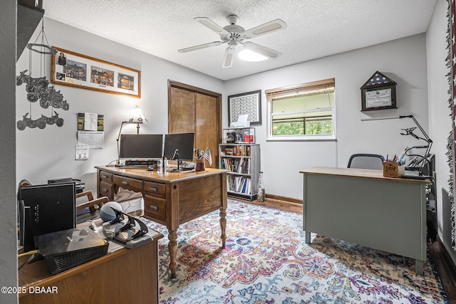 229 Riverbend Rd, Ormond Beach, FL 32174 - office space featuring ceiling fan, wood finished floors, a textured ceiling, and baseboards
