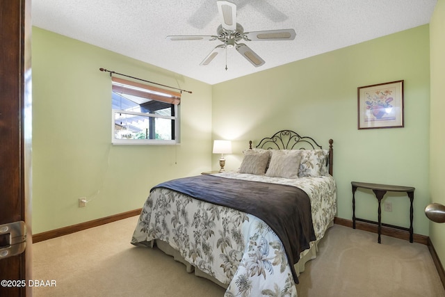 229 Riverbend Rd, Ormond Beach, FL 32174 - bedroom with carpet floors, baseboards, ceiling fan, and a textured ceiling
