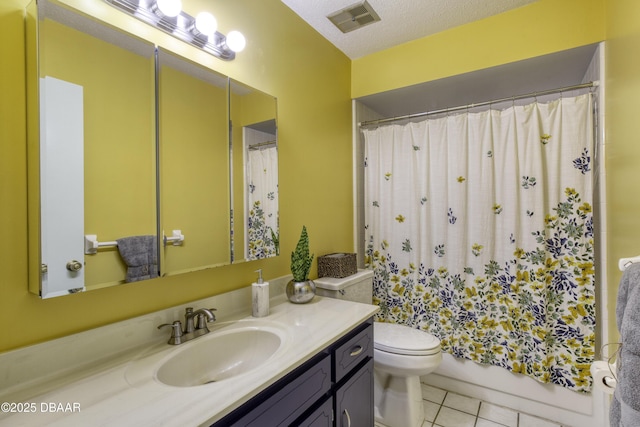 full bath featuring tile patterned flooring, visible vents, toilet, vanity, and a textured ceiling