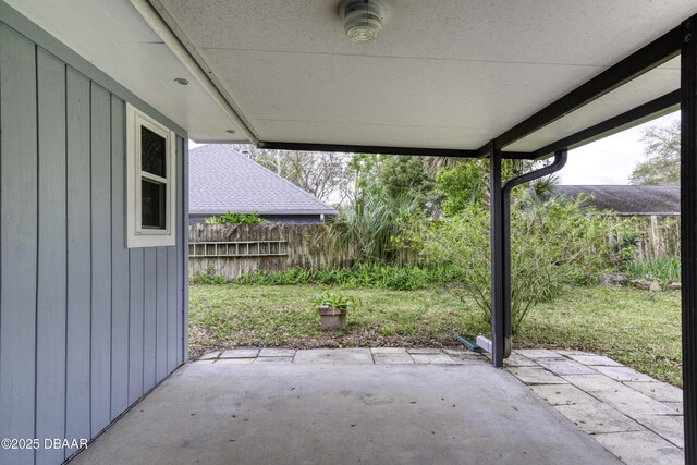 view of patio / terrace featuring fence