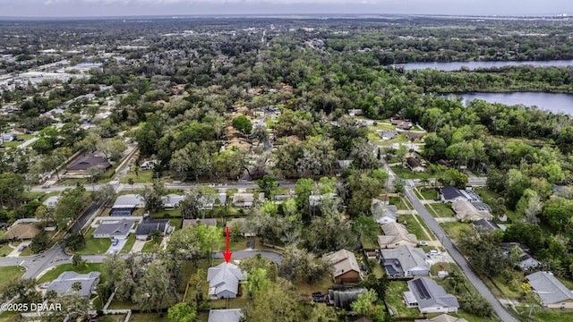 bird's eye view featuring a residential view and a water view