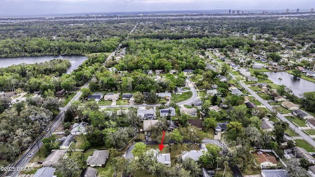 bird's eye view featuring a residential view and a water view