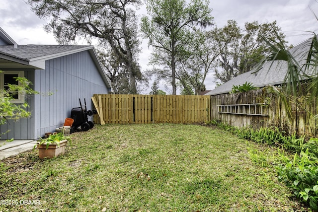 view of yard with fence