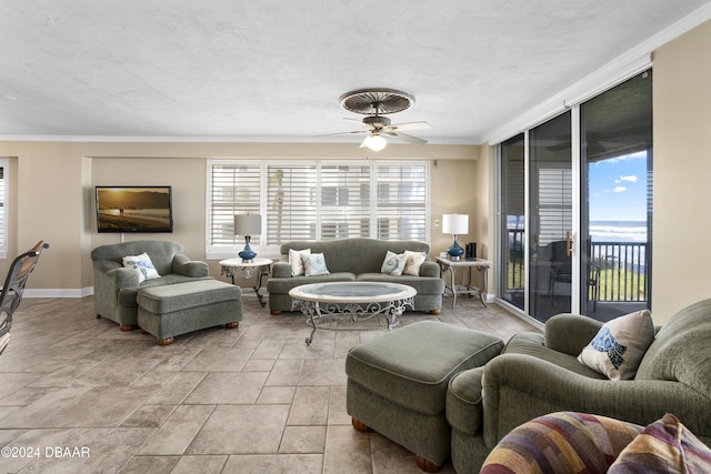 4621 S Atlantic Ave Ave Unit 7101, Ponce Inlet, FL 32127 - living room with ornamental molding and ceiling fan