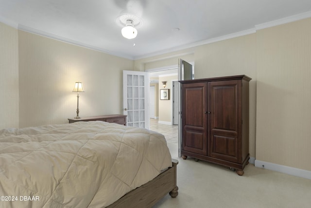4621 S Atlantic Ave Ave Unit 7101, Ponce Inlet, FL 32127 - bedroom featuring crown molding, light colored carpet, and french doors
