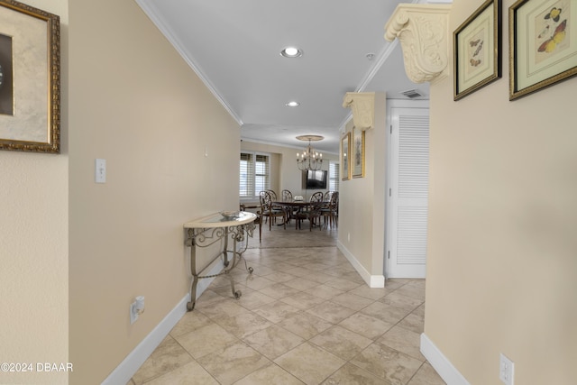 4621 S Atlantic Ave Ave Unit 7101, Ponce Inlet, FL 32127 - hall featuring crown molding, a chandelier, and recessed lighting