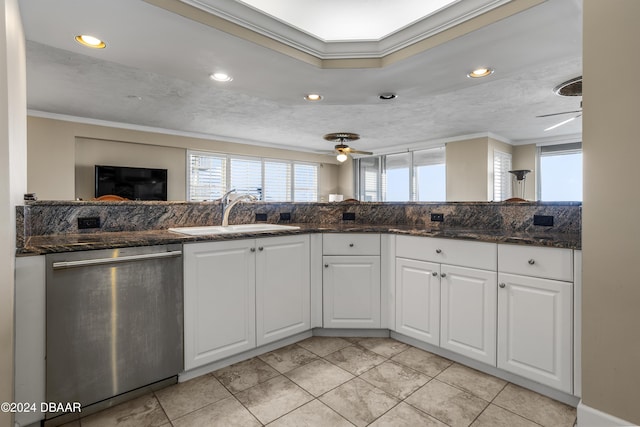 4621 S Atlantic Ave Ave Unit 7101, Ponce Inlet, FL 32127 - kitchen featuring stainless steel dishwasher, ornamental molding, a ceiling fan, plenty of natural light, and white cabinets