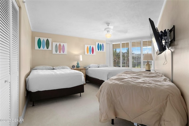 4621 S Atlantic Ave Ave Unit 7101, Ponce Inlet, FL 32127 - bedroom with light carpet and a ceiling fan