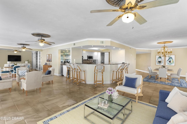 4621 S Atlantic Ave Ave Unit 7101, Ponce Inlet, FL 32127 - living area with a ceiling fan, ornamental molding, and a chandelier