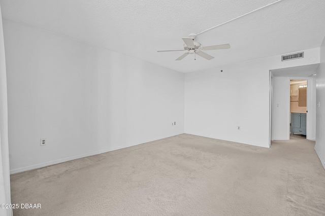 1 Oceans W Blvd Unit 8A2, Daytona Beach, FL 32118 - carpeted spare room featuring a ceiling fan and a textured ceiling