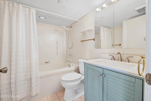 1 Oceans W Blvd Unit 8A2, Daytona Beach, FL 32118 - bathroom featuring tiled shower / bath combo, toilet, tile patterned floors, and vanity