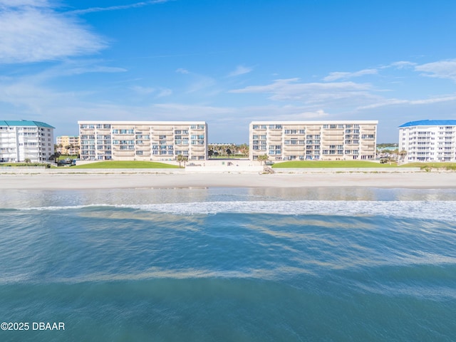 property view of water featuring a view of city and a view of the beach