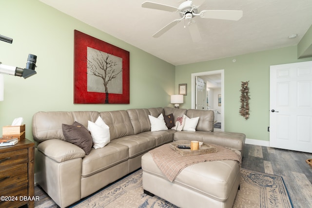 living room with ceiling fan and wood-type flooring