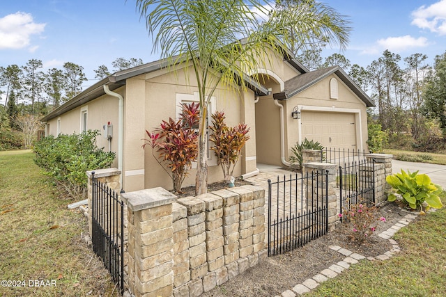 ranch-style home with a garage