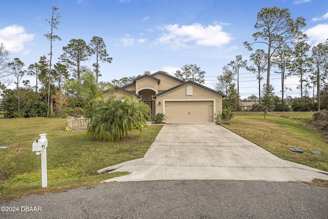 view of front of house featuring a front lawn and a garage