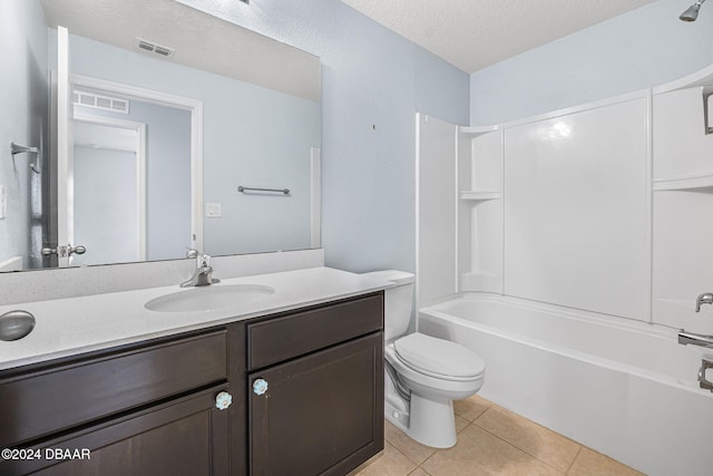 full bathroom with vanity, tile patterned flooring, toilet, a textured ceiling, and shower / bath combination