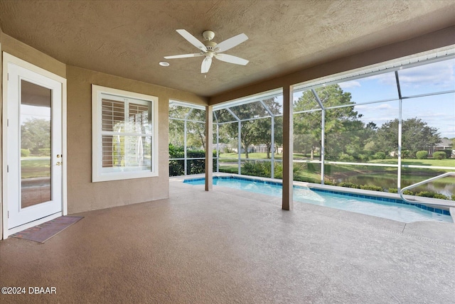 view of pool with a lanai and a patio