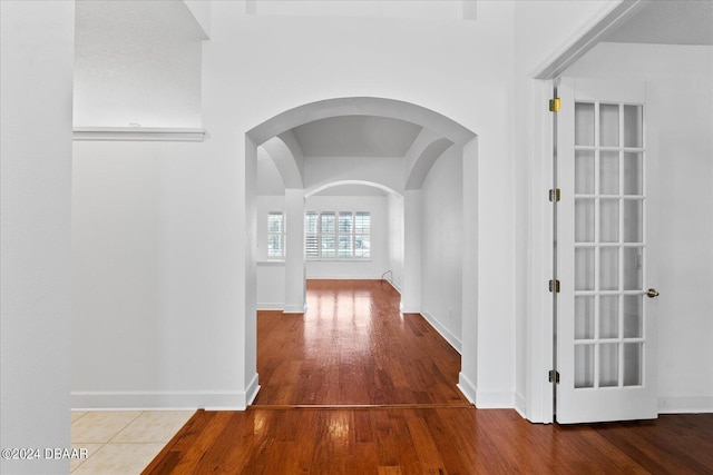 hallway featuring hardwood / wood-style flooring