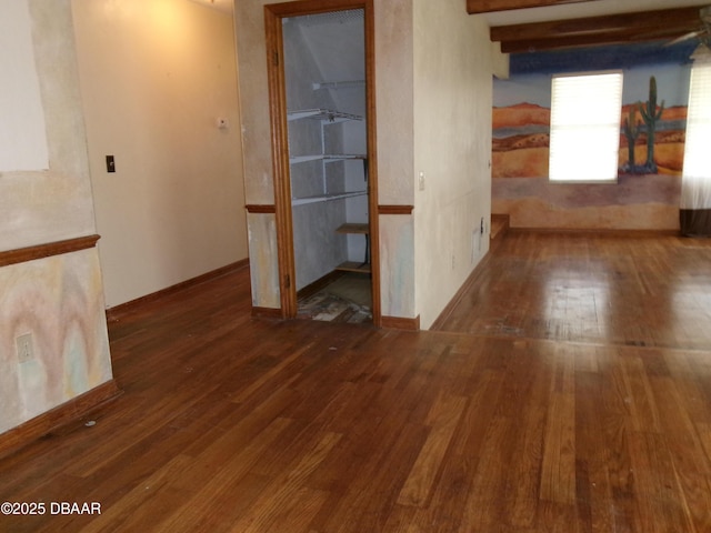 empty room featuring dark hardwood / wood-style floors